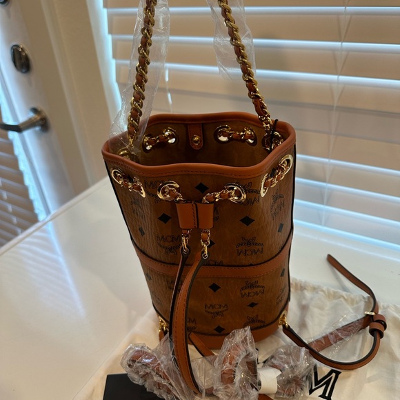 MCM Handbags - MCM Tan Backpack with Gold Details Authentic